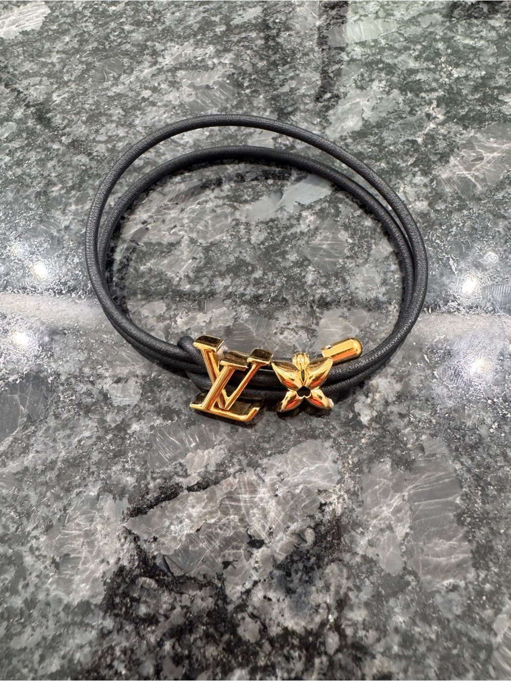 Louis Vuitton Black Cord Hair Tie with Gold LV and Flower Charms